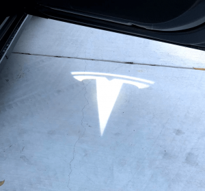 welcome lights tesla logo - tesland.com